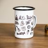 metalno-golyamo-kanche-za-planina-palatka Metal enamel mug with black and white illustrations of camping, travel, and adventure-themed objects.
