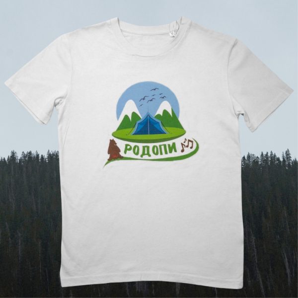 White unisex T-shirt featuring an illustration of the Rhodope Mountains, a tent, a howling wolf, and the text "Родопи" in Cyrillic with musical notes.