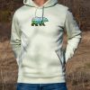 Light green hoodie with an embroidered bear featuring a scenic mountain landscape.