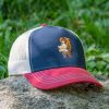 Trucker cap with embroidered hiking bear design, featuring a navy blue front, red visor, and breathable mesh back.