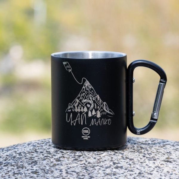 black laser engraved metal mug with carabiner and mountain design engraved with text in Bulgarian “Tea a bit”