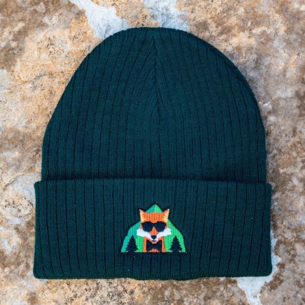 dark green knitted winter beanie with fox and forest embroidery, made of 50% acrylic and 50% recycled polyester, unisex one size