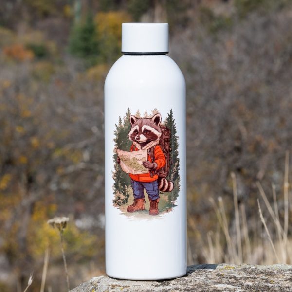 golyama-stomanena-butilka White stainless steel water bottle with a hiking raccoon illustration, standing on a rock outdoors.