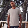 premium-svetlosiva-teniska-195g-za-pechat-i-brandirane Premium heavyweight light grey cotton t-shirt worn by a male model, ideal for custom printing, embroidery and corporate branding, 195 g/m²